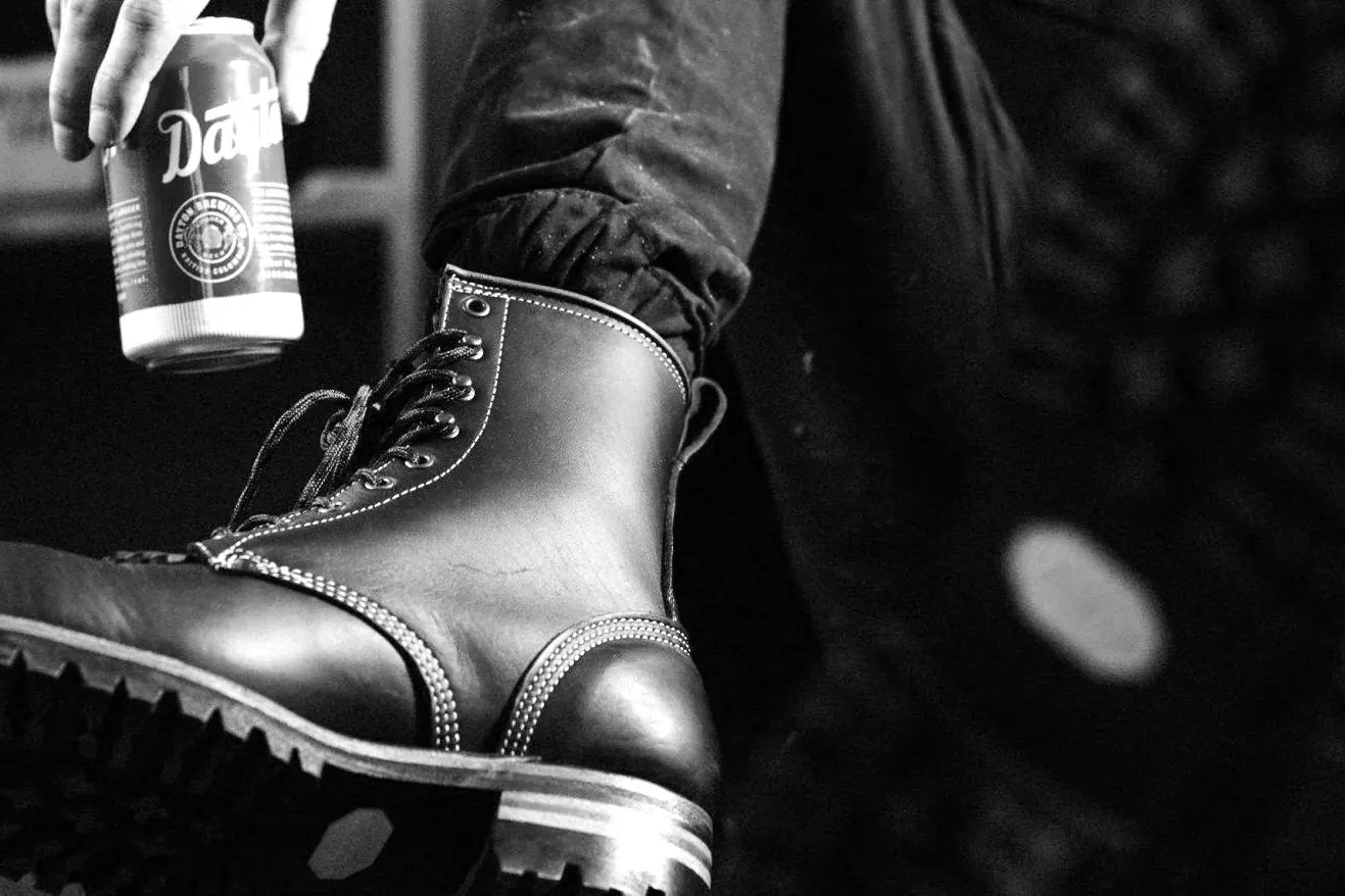 A Dayton work boot in black and white